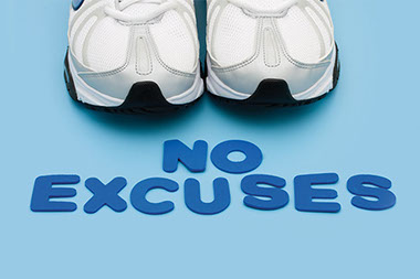 What's your excuse? Image of gym shoes with the words "No Excuses".