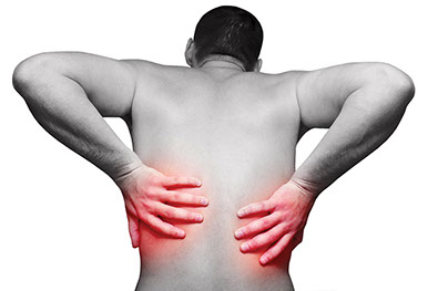 Image of a man's back in pain.