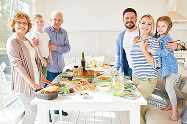 Image of family around the dinner table. Image of family around the dinner table.