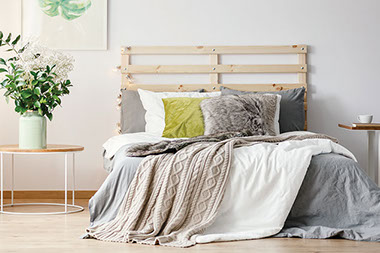 Bed with weighted blankets.