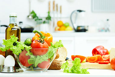 Healthy foods are on the table in the kitchen.