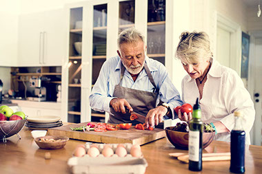 Couple cooking in the kitchen.