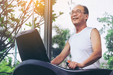 Smiling women with laptop.
