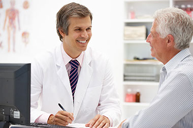 Image of doctor and patient talking.
