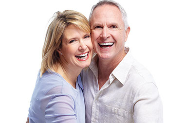 Brighter, whiter smile. Image of older couple smiling.