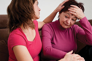 Gentle ways to support someone with depression. Image of women supporting another women with depression.