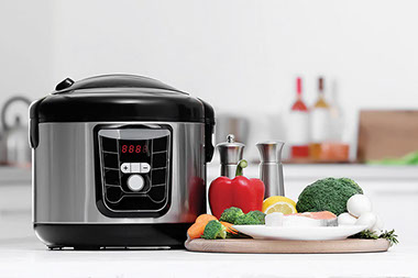 Slow cooker on counter. Slow cooker on counter.