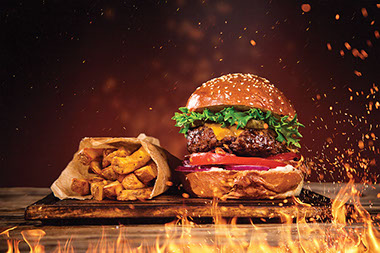 Burger with french fries and fire. Burger with french fries and fire.