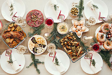 Table filled with different food dishes. Table filled with different food dishes.