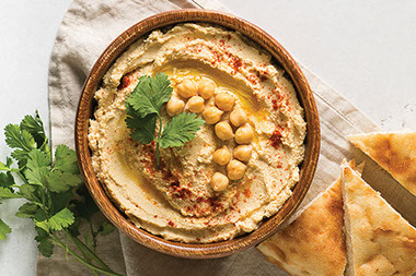 A bowl of hummus.