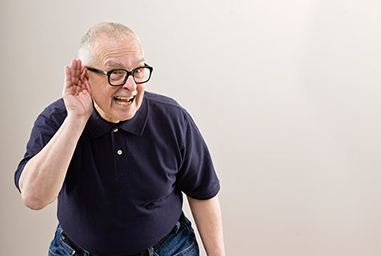 Help for hearing loss Image of mature man with hand up to his ear trying to hear.