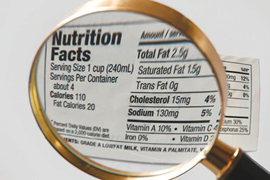 Shake salt. Image of nutrition label.