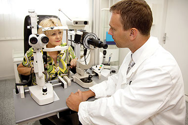 Cataract facts. Image of eye doctor and patient.