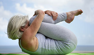 Image of women doing a curl up.