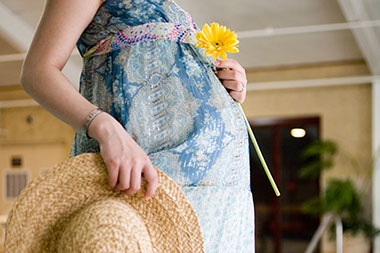 Image of pregnant women on vacation.