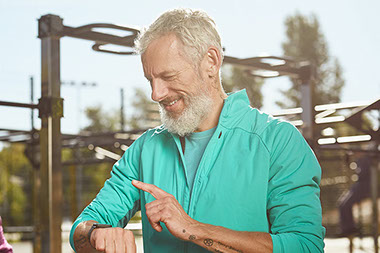 Man checking heart rate on smart watch.