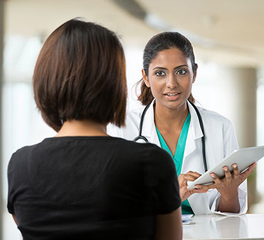 Patient rights. Image of doctor talking to patient.