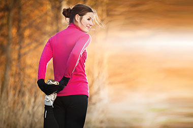 Image of women stretching.