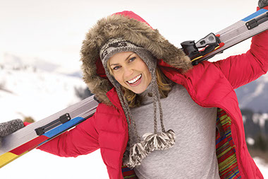 Image of women with skis.