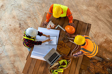 Top view of construction workers. Top view of construction workers.