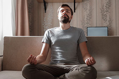 Man meditating.