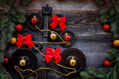 Fitness tools shaped into a Christmas tree.
