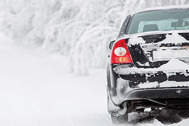 Image of an older Asian couple stretching.