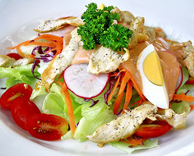 Image of a dish with food fighting items to fight cavities.
