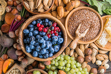 A variety of foods high in fiber. A variety of foods high in fiber.