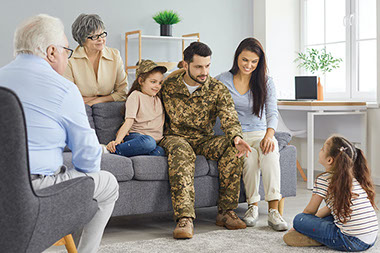 Family sitting together talking.