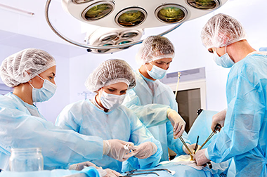 Image of doctors performing surgery.