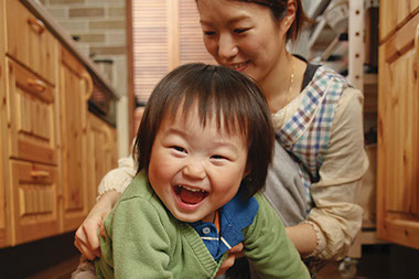 Image of mother with toddler.