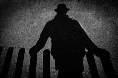 Image of a person in shadow.