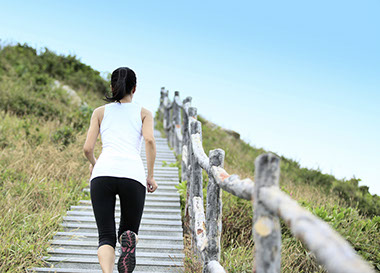 Image of women climbing oudoor stairs.