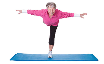 Want to improve your balance? Image of older women balancing on one leg while bending over half way.