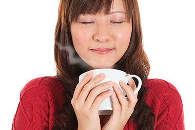 Tasty news. Image of women of a hot cup of tea.