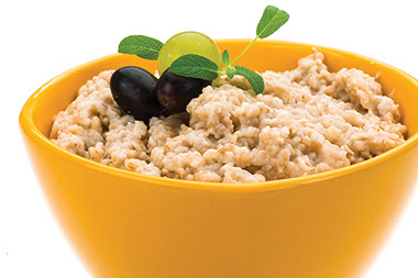 5 ways to full fuller, longer. Image of a bowl with oatmeal.