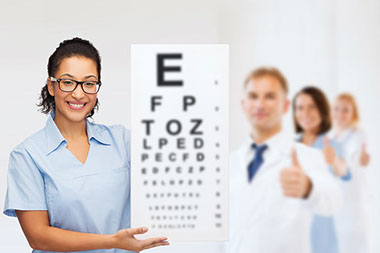 Tips to prevent trips and falls. Image of doctor holding up an eye chart.