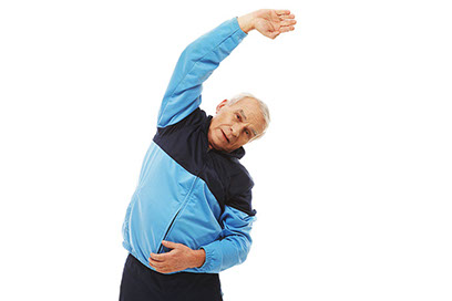The condition men don't talk about. Image of elderly man stretching.