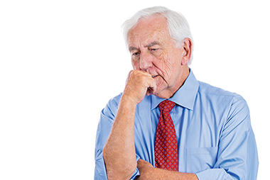 Dementia what is it? Image of older man looking confused.