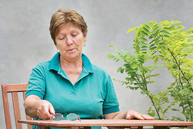 Stressed? Try this. Image of older women taking deep breaths.