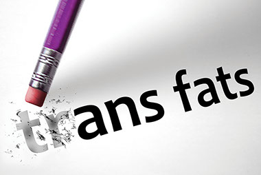 Image of pencil erasing the words "Trans Fats".