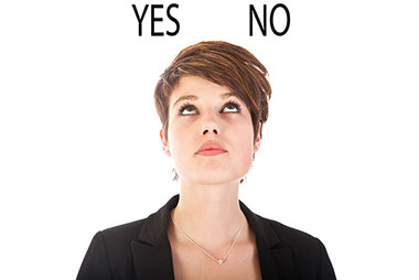 Don't make me choose Image of women looking up at the words, 'Yes' and 'No'.