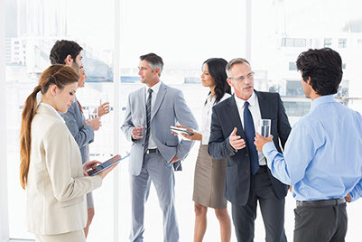 Image of co-workers talking.