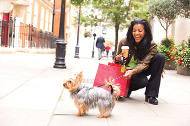 When petting pets causes disease. Image of women with her dog.