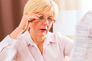 Image of women reading medication information.