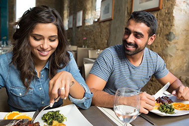 Couple having dinner at restaurant. Couple having dinner at restaurant.