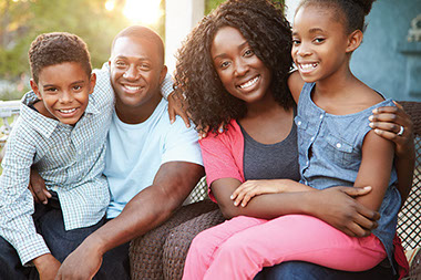 Stepping into the stepparent role. Image of husband and wife and two children.