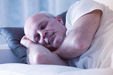 Image of man sleeping.