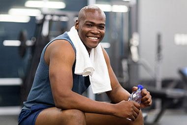 Fueling your workout the healthy way Image of man at the gym.